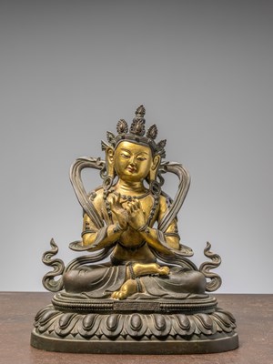 Lot 96 - A SEATED BRONZE COLD GILT BODHISATTVA, CHINA 18TH CENTURY, QIAN LONG PERIOD