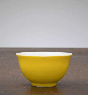 Lot 151 - A YELLOW-GLAZED CUP, CHINA; KANGXI PERIOD (1662–1722)