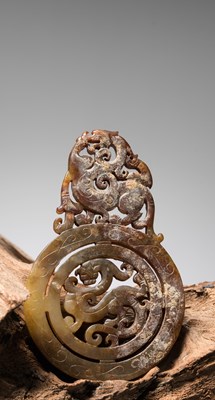 Lot 206 - A HAN DYNASTY OPENWORK JADE BI DISC, CHINA