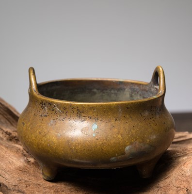 Lot 66 - A BRONZE TRIPOD CENSER WITH LOOP HANDLES CHINA, CAST WITH A XUANDE MARK