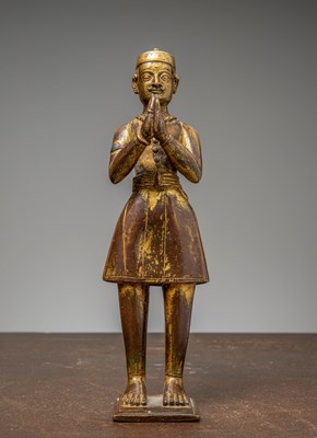 Lot 283 - A STANDING NEPALESE BRONZE DONOR, 15TH CENTURY