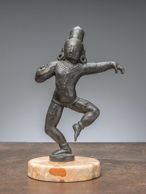 Lot 368 - A DANCING KRISHNA BRONZE, INDIA, 12TH CENTURY CHOLA PERIOD