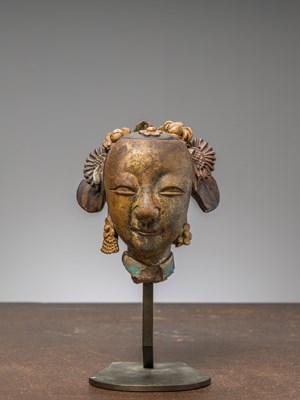 Lot 33 - A GLAZED FEMALE DEITY HEAD, SOUTH-CHINA 18TH CENTURY