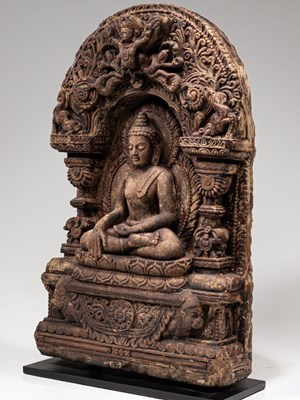 Lot 358 - BUDDHA ON THRONE SURROUNDED BY TORANA