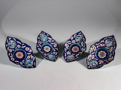 Lot 117 - FOUR LOTUS SHAPED DISHES