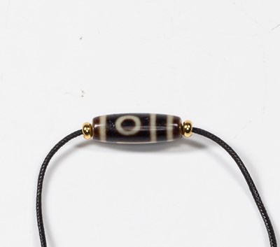 Lot 51 - AGATE DZI BEAD TIBET OR CHINA