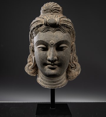 Lot 24 - HEAD OF A BUDDHA