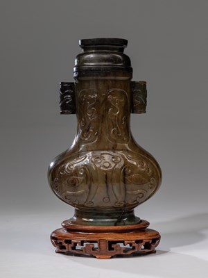 Lot 150 - (R) DARK BROWN VASE WITH LID